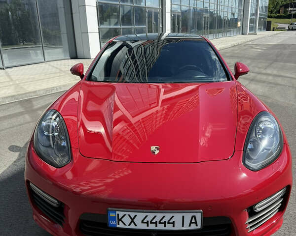 Красный Порше Панамера, объемом двигателя 4.81 л и пробегом 105 тыс. км за 31700 $, фото 1 на Automoto.ua