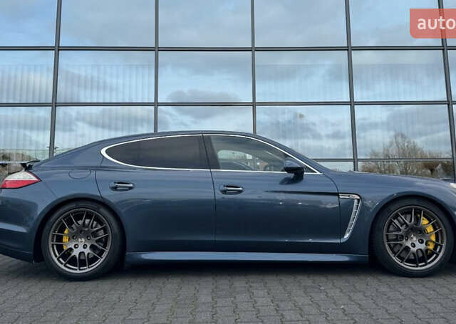 Синий Порше Панамера, объемом двигателя 4.81 л и пробегом 140 тыс. км за 42399 $, фото 1 на Automoto.ua