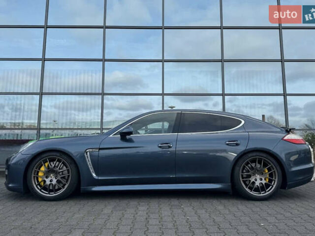 Синий Порше Панамера, объемом двигателя 4.81 л и пробегом 140 тыс. км за 42399 $, фото 2 на Automoto.ua