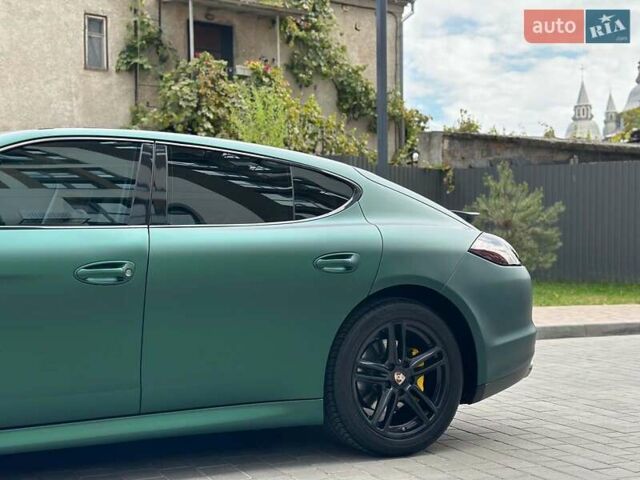 Зелений Порше Panamera, об'ємом двигуна 4.8 л та пробігом 180 тис. км за 16490 $, фото 12 на Automoto.ua