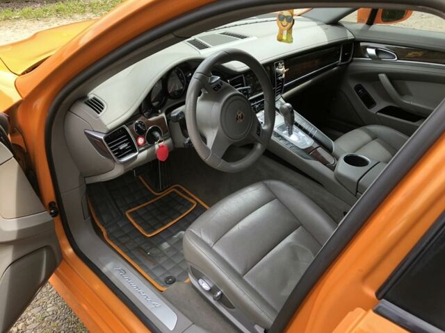 Оранжевый Порше Панамера, объемом двигателя 0.36 л и пробегом 299 тыс. км за 14875 $, фото 8 на Automoto.ua