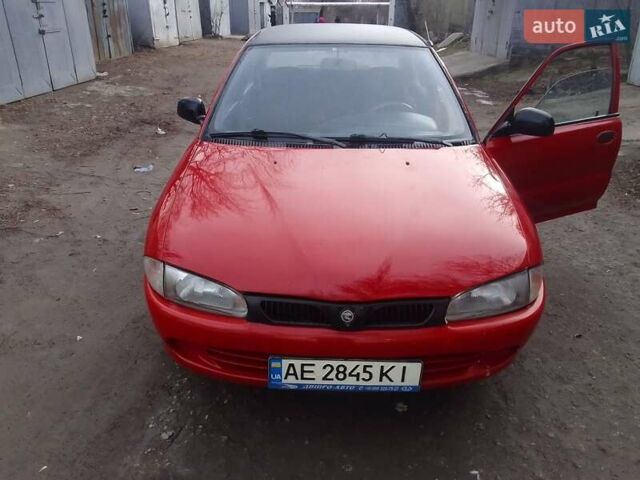 Красный Протон 415, объемом двигателя 1.5 л и пробегом 245 тыс. км за 1300 $, фото 6 на Automoto.ua