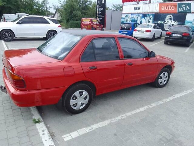 Красный Протон 415, объемом двигателя 1.5 л и пробегом 245 тыс. км за 1300 $, фото 1 на Automoto.ua
