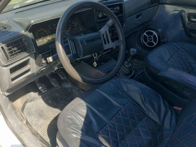 Белый Рено 19, объемом двигателя 1.7 л и пробегом 300 тыс. км за 1400 $, фото 6 на Automoto.ua