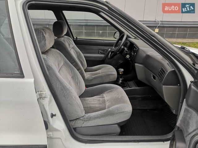 Білий Рено 19, об'ємом двигуна 1.8 л та пробігом 280 тис. км за 1200 $, фото 10 на Automoto.ua