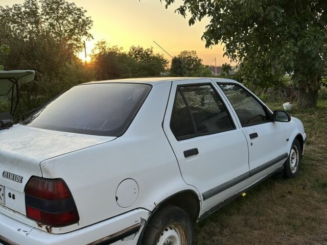 Белый Рено 19, объемом двигателя 1.9 л и пробегом 400 тыс. км за 499 $, фото 1 на Automoto.ua