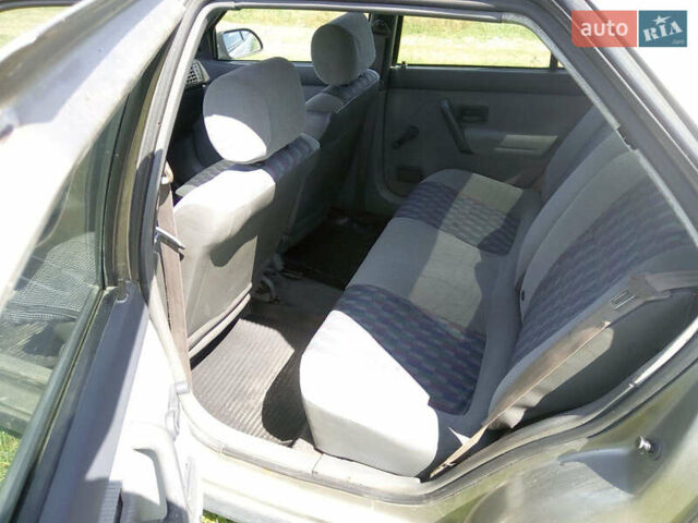 Черный Рено 19, объемом двигателя 1.7 л и пробегом 170 тыс. км за 750 $, фото 5 на Automoto.ua