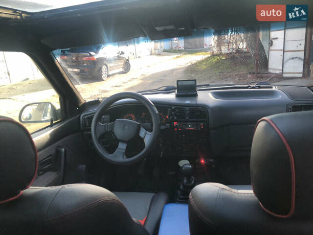 Чорний Рено 19, об'ємом двигуна 1.8 л та пробігом 197 тис. км за 1399 $, фото 8 на Automoto.ua