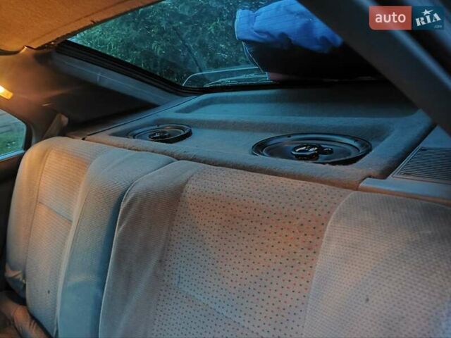 Серый Рено 19, объемом двигателя 1.8 л и пробегом 300 тыс. км за 799 $, фото 7 на Automoto.ua