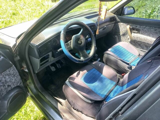 Сірий Рено 19, об'ємом двигуна 1.7 л та пробігом 175 тис. км за 950 $, фото 3 на Automoto.ua