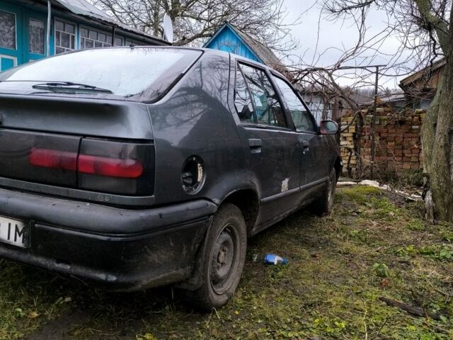 Серый Рено 19, объемом двигателя 1.4 л и пробегом 300 тыс. км за 303 $, фото 3 на Automoto.ua