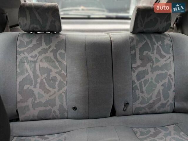 Серый Рено 19, объемом двигателя 1.8 л и пробегом 200 тыс. км за 848 $, фото 3 на Automoto.ua