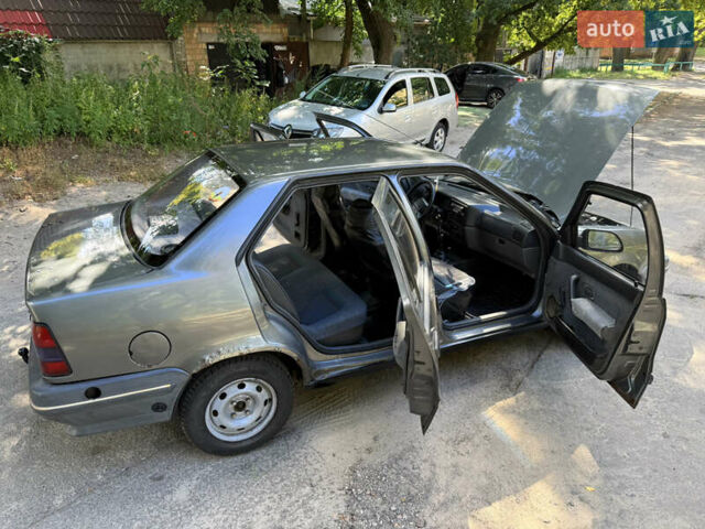 Сірий Рено 19, об'ємом двигуна 1.4 л та пробігом 490 тис. км за 750 $, фото 12 на Automoto.ua
