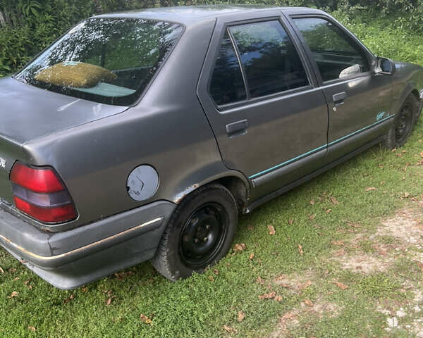 Серый Рено 19, объемом двигателя 1.4 л и пробегом 230 тыс. км за 500 $, фото 1 на Automoto.ua