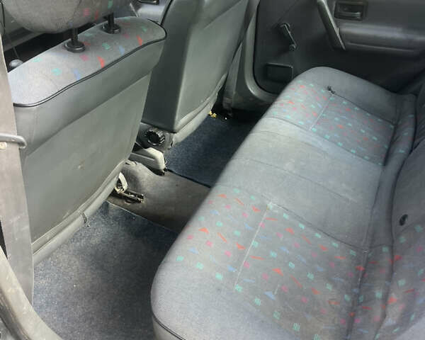 Серый Рено 19, объемом двигателя 1.4 л и пробегом 230 тыс. км за 500 $, фото 12 на Automoto.ua