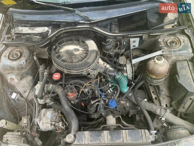 Серый Рено 19, объемом двигателя 1.4 л и пробегом 230 тыс. км за 500 $, фото 16 на Automoto.ua