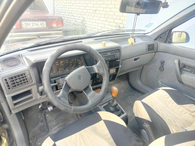 Синий Рено 19, объемом двигателя 1.4 л и пробегом 368 тыс. км за 900 $, фото 3 на Automoto.ua