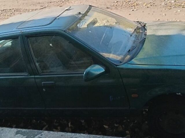 Зеленый Рено 19, объемом двигателя 1.7 л и пробегом 264 тыс. км за 800 $, фото 4 на Automoto.ua