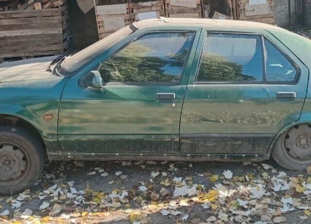 Зеленый Рено 19, объемом двигателя 1.7 л и пробегом 264 тыс. км за 800 $, фото 5 на Automoto.ua