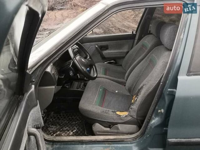 Зеленый Рено 19, объемом двигателя 1.4 л и пробегом 300 тыс. км за 500 $, фото 8 на Automoto.ua