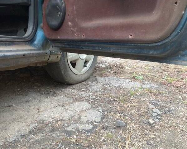 Зеленый Рено 19, объемом двигателя 1.39 л и пробегом 202 тыс. км за 1200 $, фото 11 на Automoto.ua