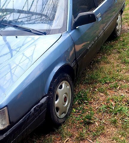 Серый Рено 21, объемом двигателя 2 л и пробегом 274 тыс. км за 700 $, фото 1 на Automoto.ua