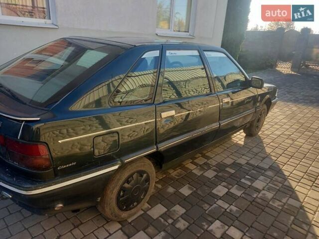 Зелений Рено 21, об'ємом двигуна 1.7 л та пробігом 111 тис. км за 1000 $, фото 4 на Automoto.ua