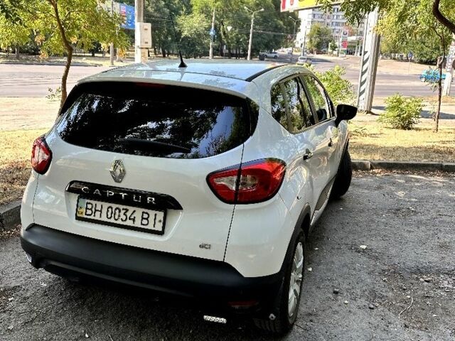 Білий Рено Каптур, об'ємом двигуна 1.5 л та пробігом 220 тис. км за 11200 $, фото 2 на Automoto.ua