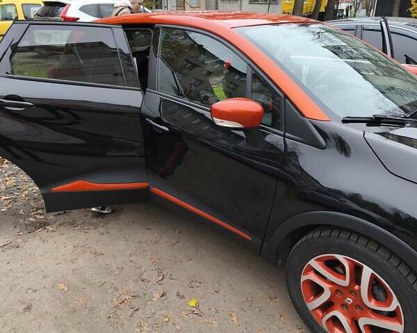 Черный Рено Каптур, объемом двигателя 1.2 л и пробегом 124 тыс. км за 13500 $, фото 12 на Automoto.ua