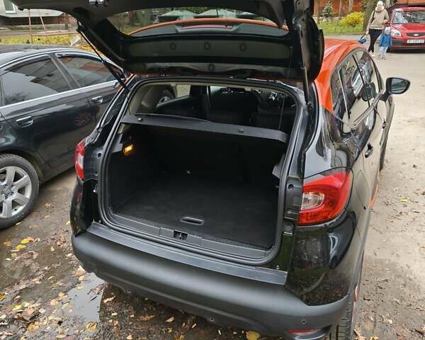Черный Рено Каптур, объемом двигателя 1.2 л и пробегом 124 тыс. км за 13500 $, фото 5 на Automoto.ua