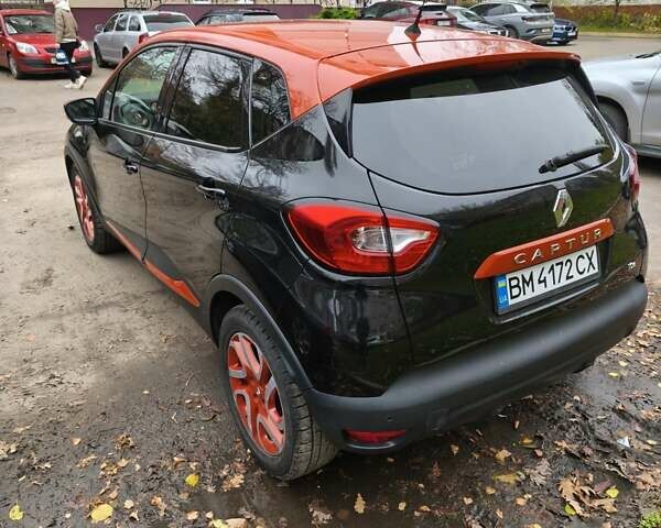 Черный Рено Каптур, объемом двигателя 1.2 л и пробегом 124 тыс. км за 13500 $, фото 4 на Automoto.ua