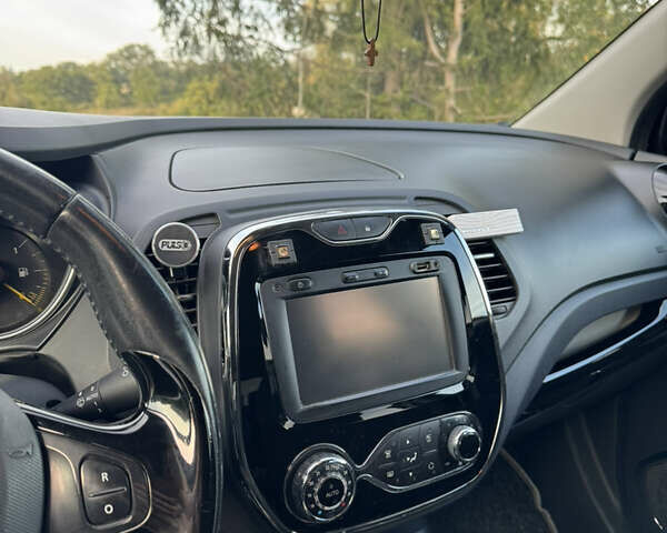Черный Рено Каптур, объемом двигателя 1.5 л и пробегом 188 тыс. км за 12400 $, фото 10 на Automoto.ua