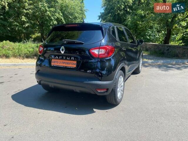 Черный Рено Каптур, объемом двигателя 1.5 л и пробегом 199 тыс. км за 11500 $, фото 4 на Automoto.ua