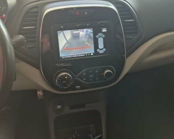 Черный Рено Каптур, объемом двигателя 1.2 л и пробегом 61 тыс. км за 14599 $, фото 12 на Automoto.ua