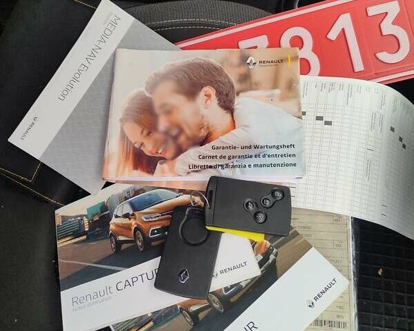 Черный Рено Каптур, объемом двигателя 1.2 л и пробегом 61 тыс. км за 14599 $, фото 1 на Automoto.ua