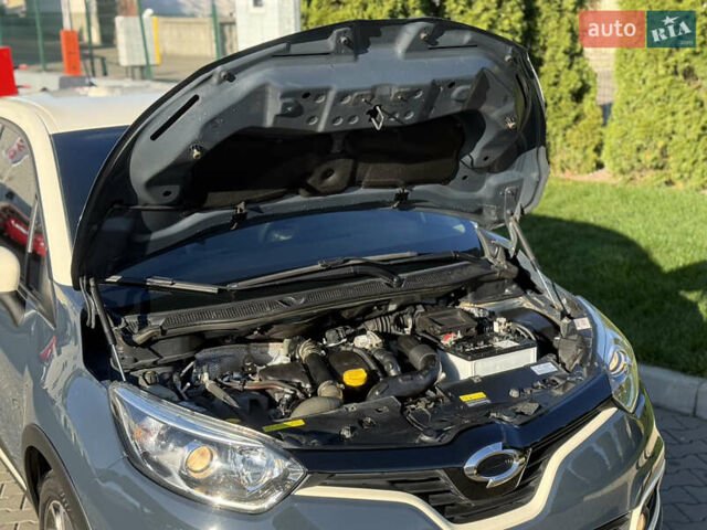 Синий Рено Каптур, объемом двигателя 1.5 л и пробегом 94 тыс. км за 11500 $, фото 48 на Automoto.ua
