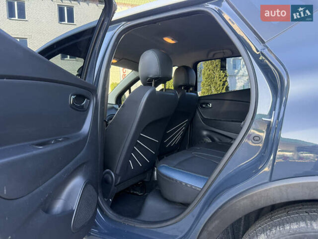 Синий Рено Каптур, объемом двигателя 1.5 л и пробегом 94 тыс. км за 11500 $, фото 32 на Automoto.ua