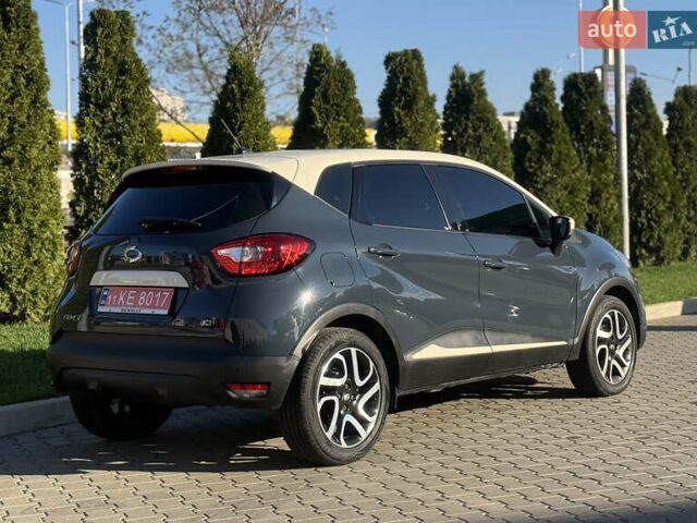 Синий Рено Каптур, объемом двигателя 1.5 л и пробегом 94 тыс. км за 11500 $, фото 21 на Automoto.ua