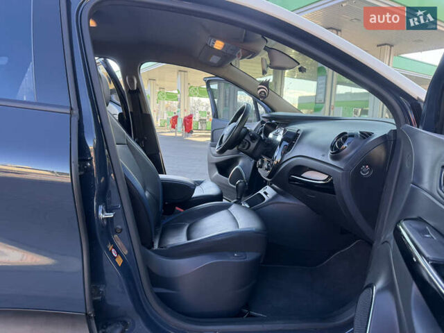 Синий Рено Каптур, объемом двигателя 1.5 л и пробегом 94 тыс. км за 11500 $, фото 40 на Automoto.ua