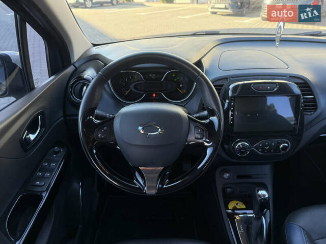 Синий Рено Каптур, объемом двигателя 1.5 л и пробегом 94 тыс. км за 11500 $, фото 26 на Automoto.ua