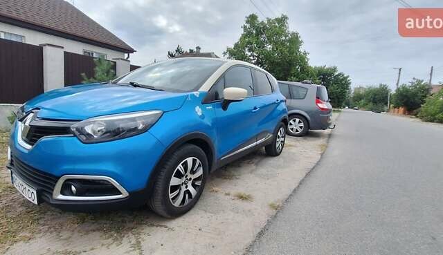 Синій Рено Каптур, об'ємом двигуна 1.2 л та пробігом 98 тис. км за 11350 $, фото 11 на Automoto.ua