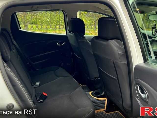 Белый Рено Клио, объемом двигателя 1.5 л и пробегом 149 тыс. км за 10300 $, фото 13 на Automoto.ua