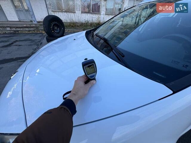 Белый Рено Клио, объемом двигателя 1.2 л и пробегом 206 тыс. км за 6400 $, фото 66 на Automoto.ua