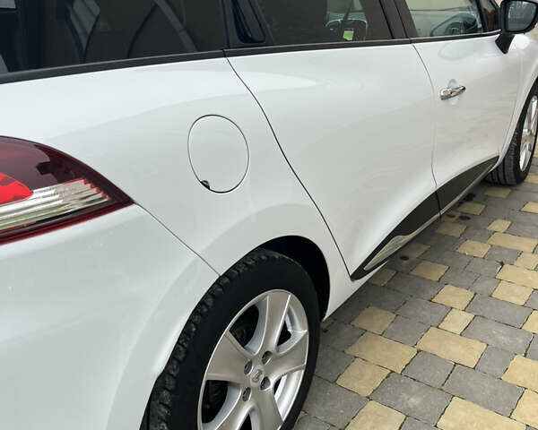 Белый Рено Клио, объемом двигателя 1.5 л и пробегом 260 тыс. км за 7550 $, фото 19 на Automoto.ua