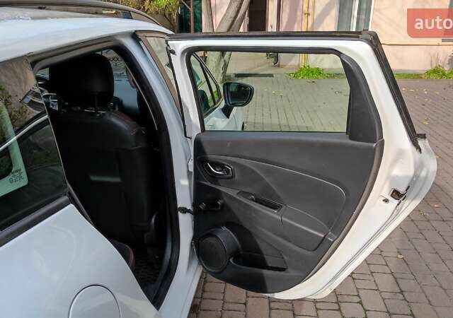 Белый Рено Клио, объемом двигателя 1.5 л и пробегом 259 тыс. км за 7400 $, фото 54 на Automoto.ua