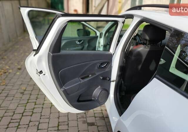 Белый Рено Клио, объемом двигателя 1.5 л и пробегом 259 тыс. км за 7400 $, фото 38 на Automoto.ua