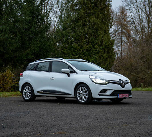 Белый Рено Клио, объемом двигателя 1.5 л и пробегом 192 тыс. км за 9700 $, фото 2 на Automoto.ua