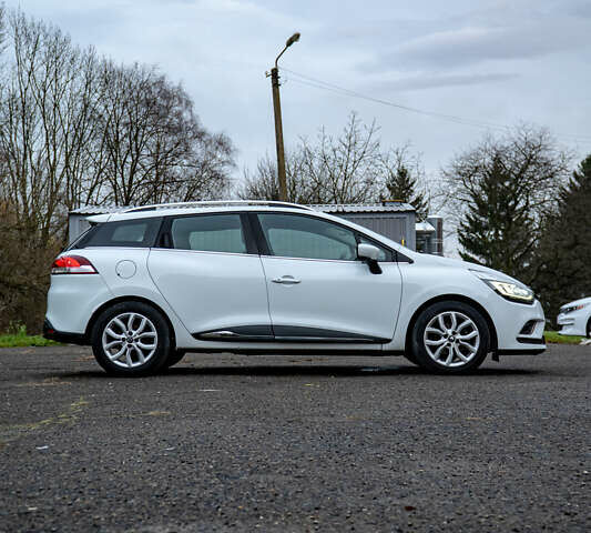 Белый Рено Клио, объемом двигателя 1.5 л и пробегом 192 тыс. км за 9700 $, фото 17 на Automoto.ua