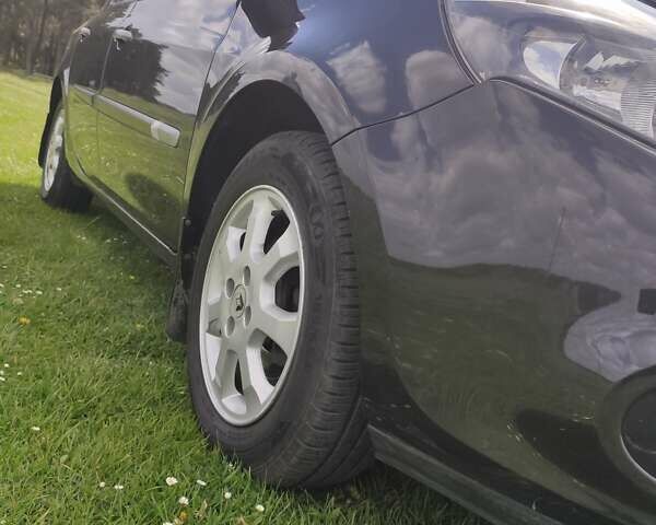 Черный Рено Клио, объемом двигателя 1.5 л и пробегом 126 тыс. км за 6500 $, фото 18 на Automoto.ua