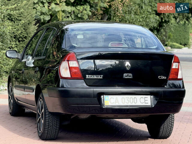 Черный Рено Клио, объемом двигателя 1.4 л и пробегом 210 тыс. км за 3999 $, фото 25 на Automoto.ua